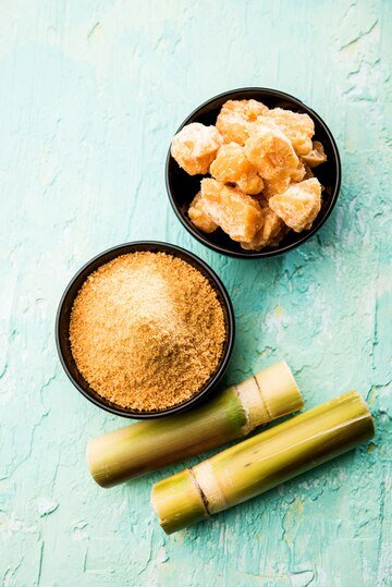 organic-gur-jaggery-powder-is-unrefined-sugar-obtained-from-concentrated-sugarcane-juice-served-bowl-selective-focus_466689-37018